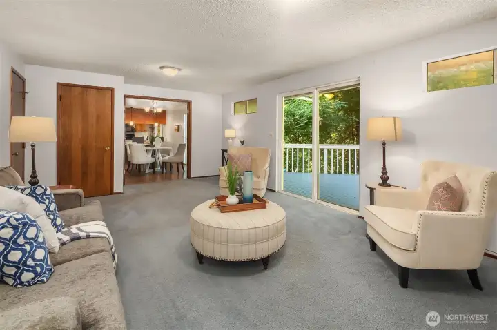 Family room with slider to the deck. Family room with slider to the deck.