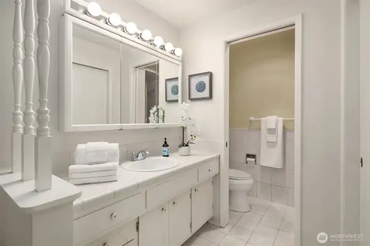 Primary bathroom with 3/4 bathroom. Primary bathroom with 3/4 bathroom.