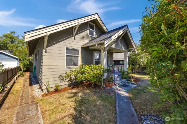 Easy access all the way around the house. Looking for a space for a dog run or how about bocce ball?