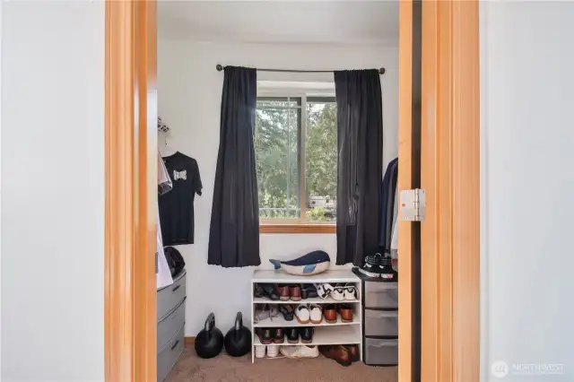 Master walk-in closet has a window.