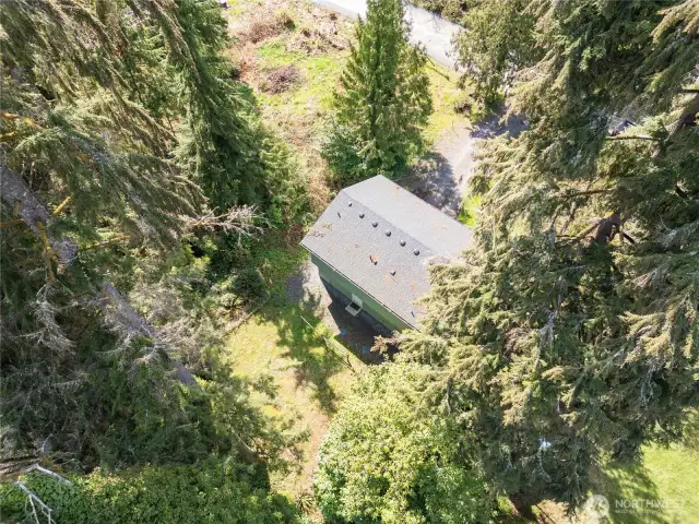 This home enjoys the feeling of seclusion, yet is all of 5 miles from town.