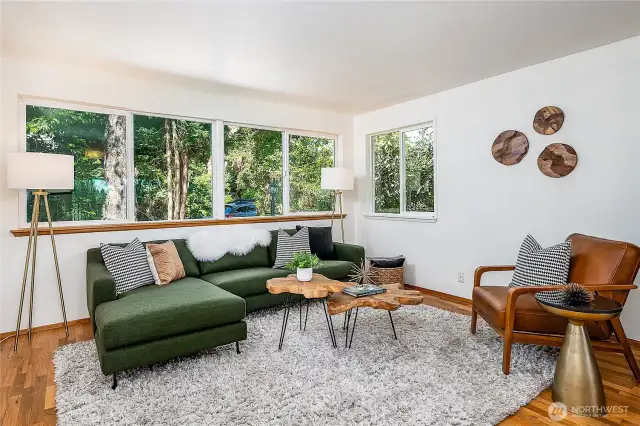 Main floor living room w/wall of windows