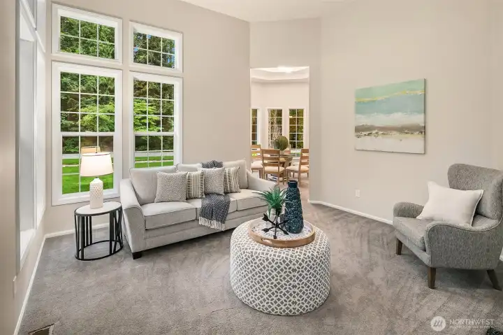 Living room flows into formal dining space.