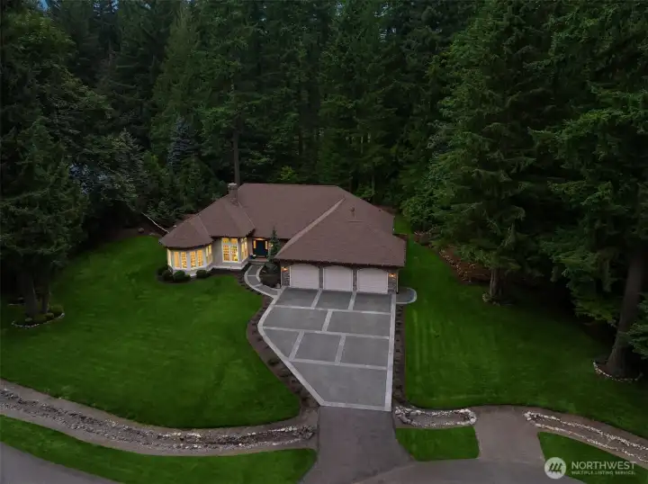 50 year roof with transferrable warranty installed in 2015, oversized 6" gutters installed in 2022.
