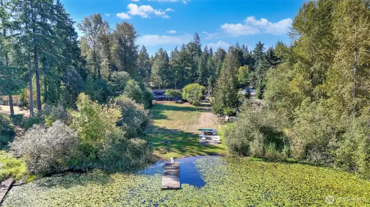 A true waterfront lifestyle with direct dock and lake access. Lilly pads will be removed when the state gives approval. Removal service has been paid for by seller.