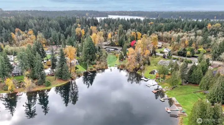 Serene waterfront living on Shady Lake in Renton, WA! This stunning lake house boasts breathtaking views, private lake frontage, and a tranquil atmosphere perfect for relaxation and outdoor adventures.