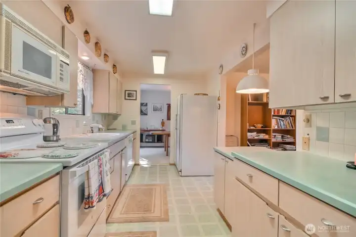 Kitchen with tons of counter space and cupboards.