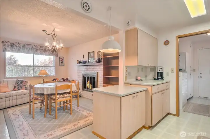 Kitchen to living -room. Gas fireplace.