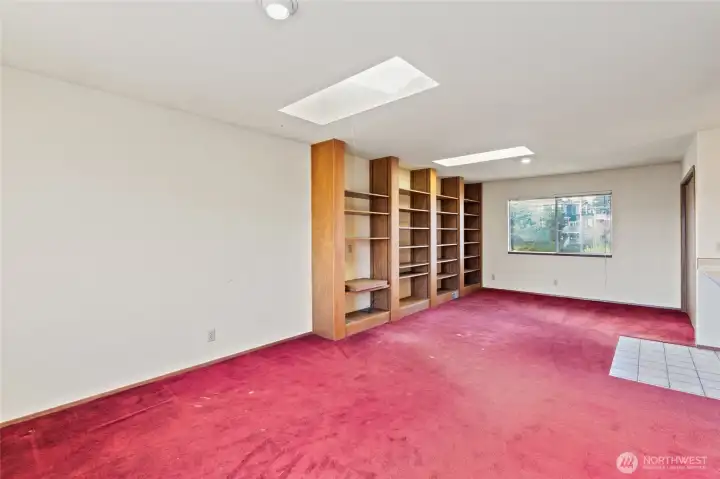 Family room with built-in shelves.