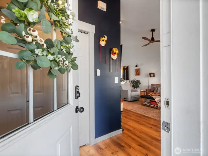 Vaulted ceilings welcome you into this home