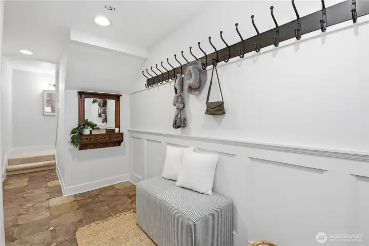 The ground floor welcomes you to a spacious entry foyer and a generous single-car garage, blending everyday function with refined style.