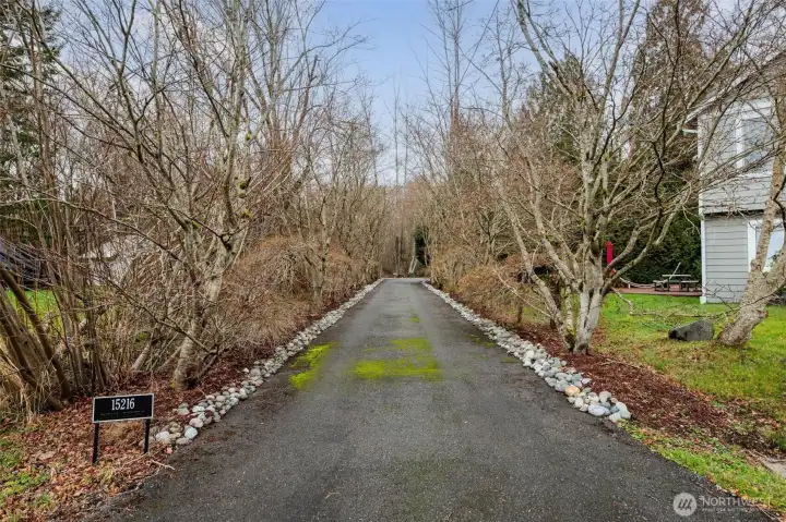Long driveway at the end of a cul-de-sac.