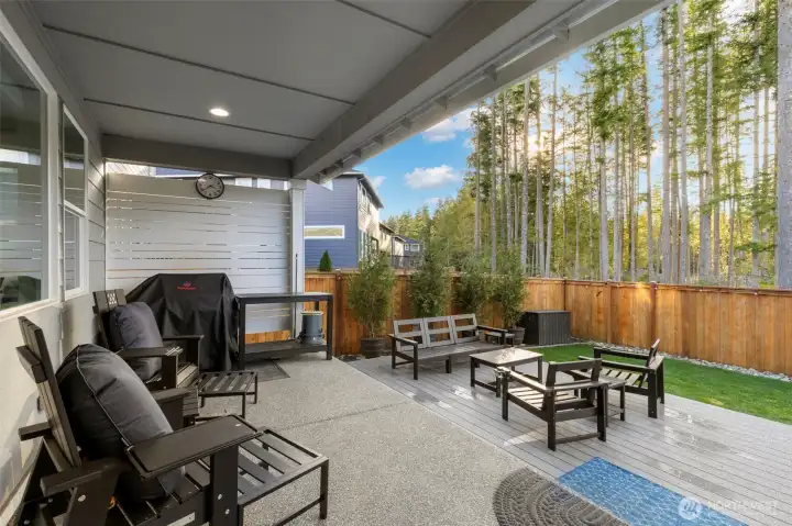 Backyard Oasis with covered back porch and trex deck for all your entertaining needs.
