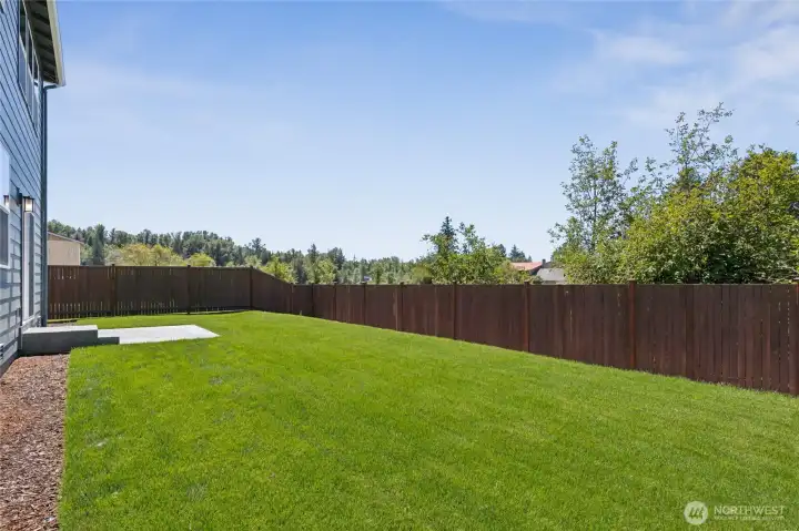 Fully fenced and landscaped yard included. Photo is representational and approximate. Actual home is under construction and size and topography of the lot will vary. See site agent for details.