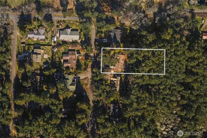 Two tax parcels. There is a 15' alley between the parcels.