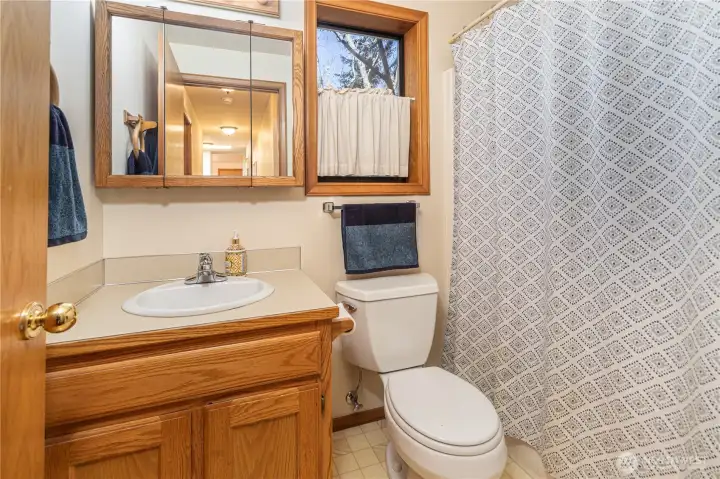 Hall full bath with a tub/shower.