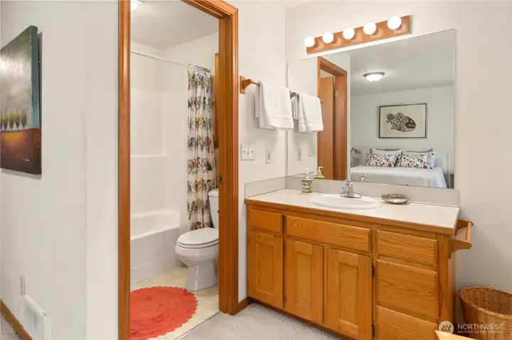 Primary bath has a tub/shower.