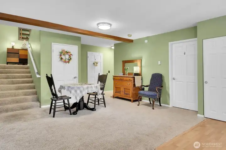 Game Area centered from the Staircase & Den & Bath & Laundry Room