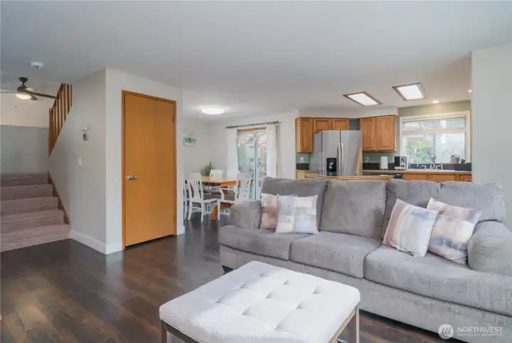 Family room off kitchen, stairs leading up stairs to bedooms