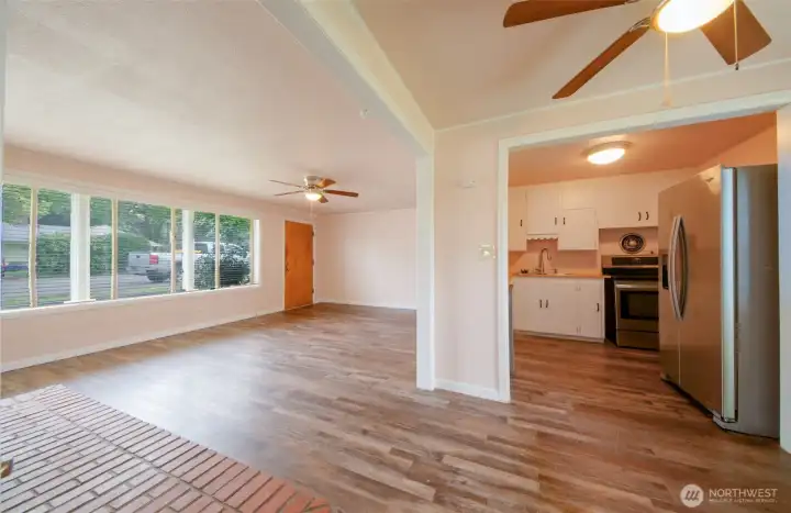 View from dining area of kitchen and living area