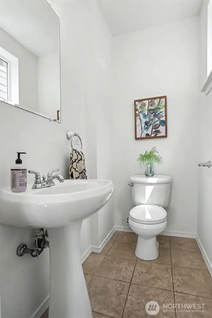 A small powder room for your guests. A small powder room for your guests.