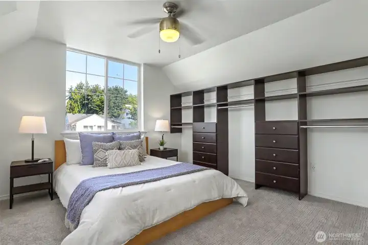 The primary bedroom on the top floor with a built in closet set. The primary bedroom on the top floor with a built in closet set.