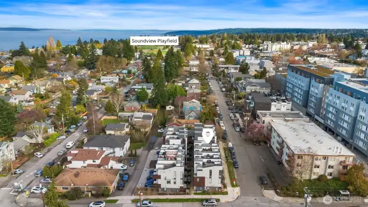 Aerial view facing North showcasing close proximity to Soundview Playfield, tennis courts & pickleball courts. Aerial view facing North showcasing close proximity to Soundview Playfield, tennis courts & pickleball courts.