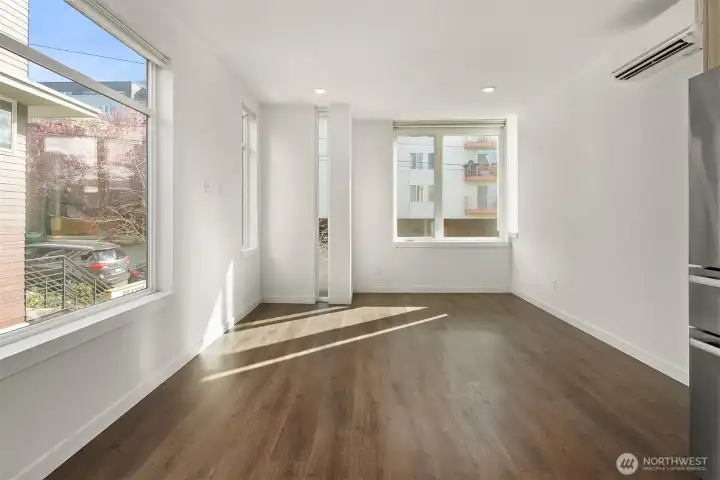 Main floor with large East facing windows. Main floor with large East facing windows.