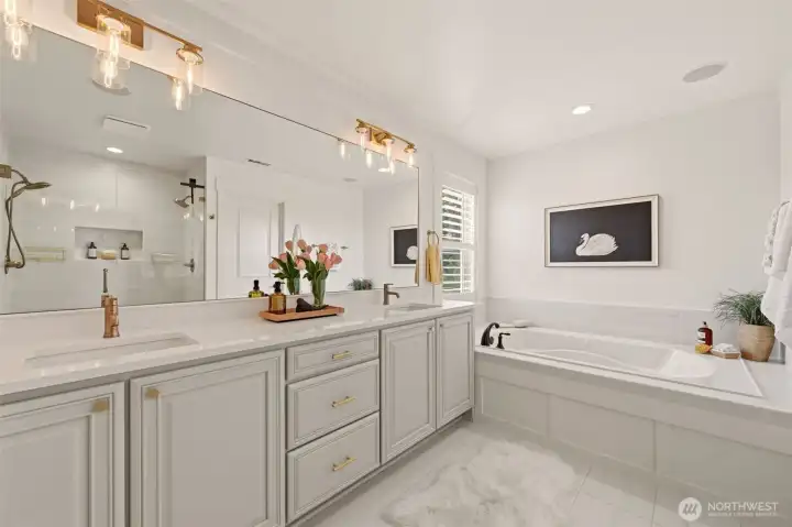 Master bathroom with updated ceramic tile and designer fixtures Master bathroom with updated ceramic tile and designer fixtures