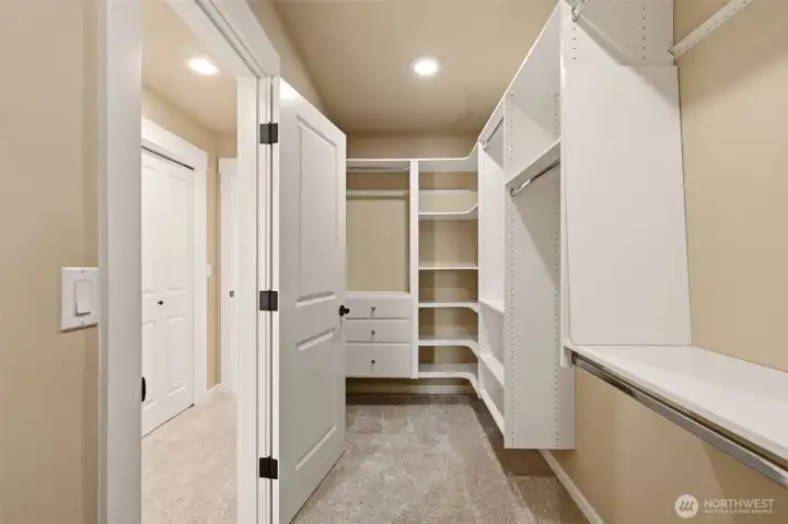Expansive California closet in master suite Expansive California closet in master suite