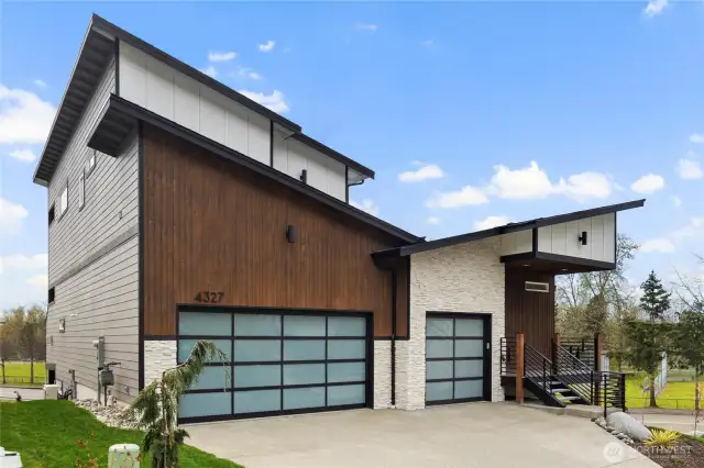 Covered Front Patio - 3 Car Garages - Standard Features include $100,000 in upgrades!