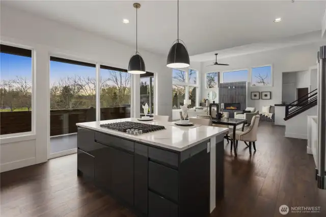 Quartz Counters, Full Height Custom Backsplash & Upgraded Lighting