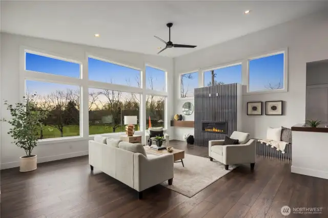 Main Floor Open Great Room - Stone Wrapped Gas Fireplace - Energy Efficient Vinyl Windows with Views of River & Park