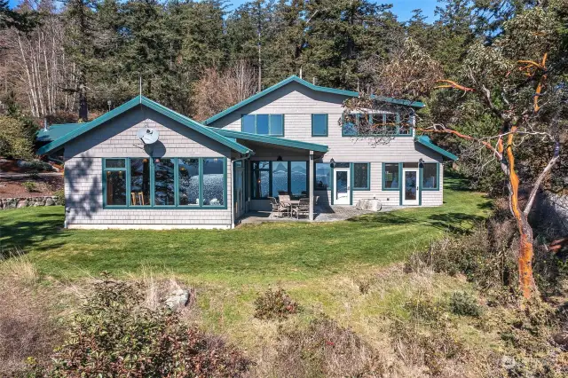 Main house with coastal charm was designed by Edward Carr!