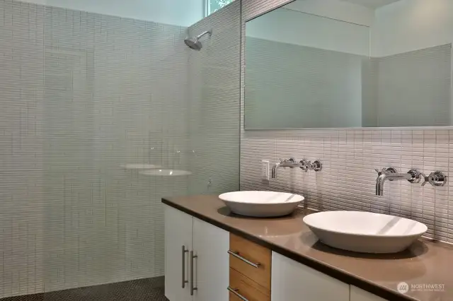 Primary bath with Ann Sacks tile & quartz countertops.