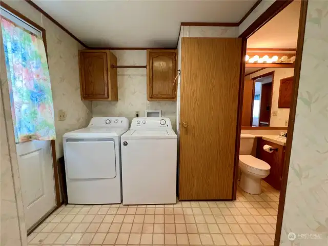 laundry room off kitchen & bath