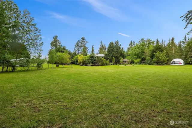 This nice flat pasture area would make a great spot for an arena