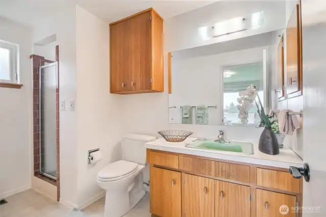 The primary bath features a walk-in shower