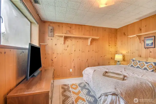 The lower level features a finished room which could be used as a 4th bedroom