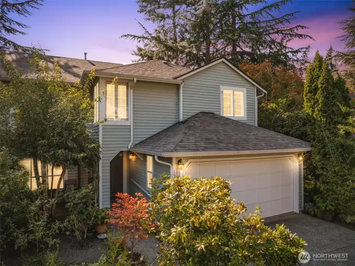 Cul-de-sac location with 2 car garage, 2 car driveway and 5 guest parking spots. Front deck sitting area with front yard and garden space. Right side of house additional garden space.