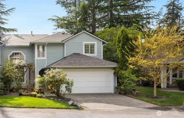 Cul-de-sac location with 2 car garage, 2 car driveway and 5 guest parking spots. Front deck sitting area with front yard and garden space. Right side of house additional garden space.