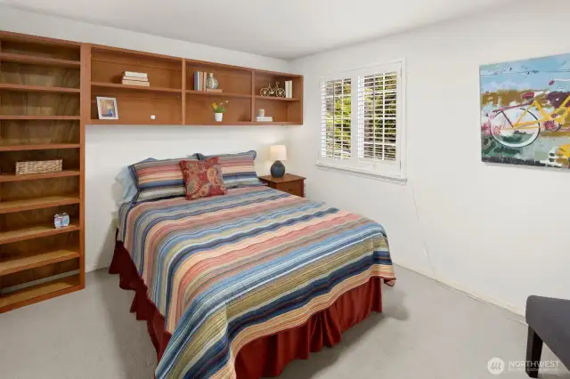 2nd floor guest room #2 with custom cedar cabinets, walk-in closet with custom built in cabinets.