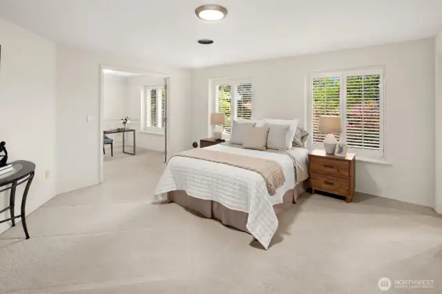 Large primary bedroom with additional attached room and 5 piece bathroom.