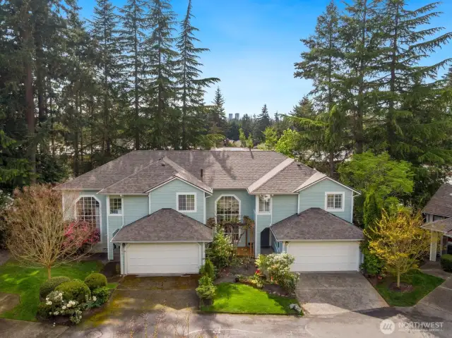 Cul-de-sac location with 2 car garage, 2 car driveway and 5 guest parking spots. Front deck sitting area with front yard and garden space. Right side of house additional garden space.