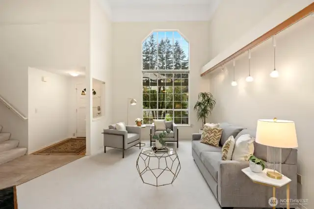 Main floor with circular floor plan and vaulted ceilings.