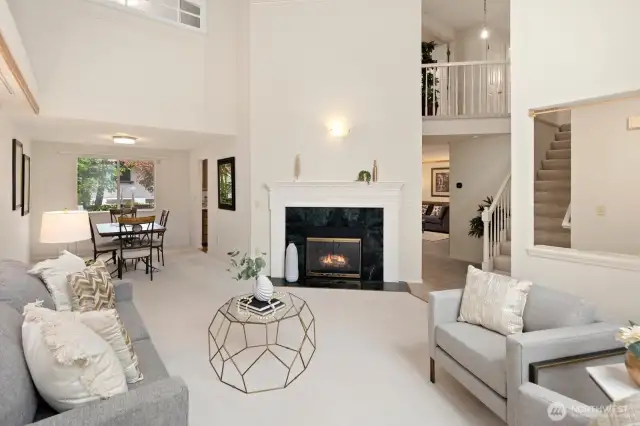 Main floor with circular floor plan and vaulted ceilings.