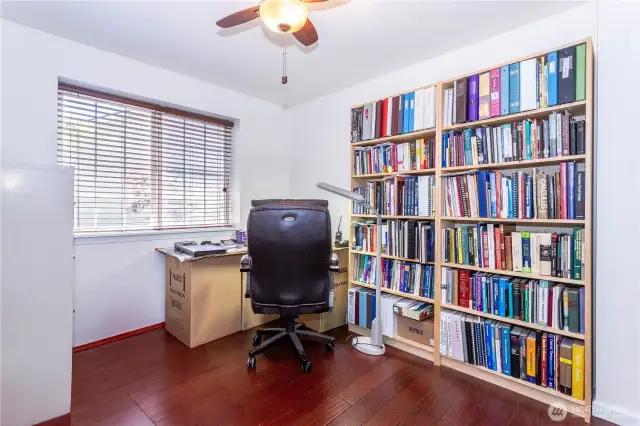 Third bedroom. Both upper bedrooms have standard closets with bifold doors and built-in closet organizers.