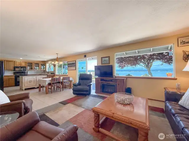 Views from living room, dining room, kitchen, deck, yard.