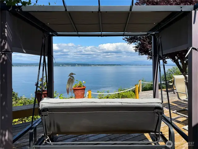 Relax in the swing on your large East facing deck.