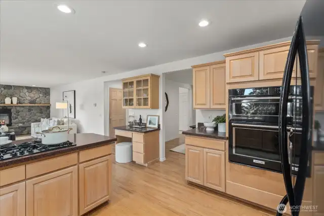 Built-in oven and microwave are set at the perfect height for convenience, with a deep storage drawer below for easy access to cookware and baking essentials.